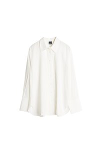White long-sleeve shirt made of lightweight fabric, featuring a classic collar, button closure, and rounded hem with side slits.