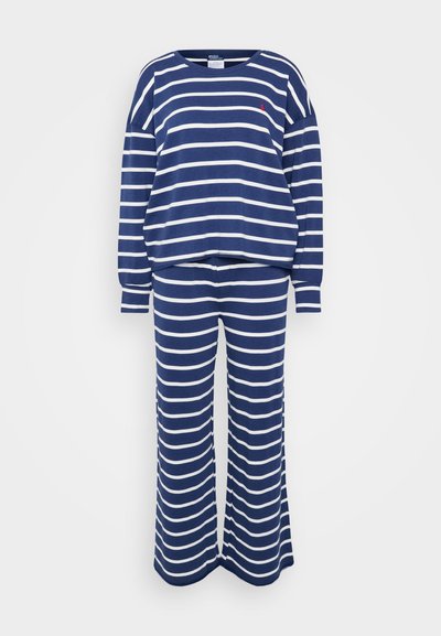 Marinblå och vit randig lounge-set som består av en långärmad topp med rund halsringning och matchande vida byxor, tillverkade av mjukt tyg.
