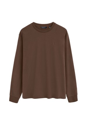 Brun bluse med rund hals og lange ærmer med ribkant ved ærmerne og lille broderet logo på venstre bryst.