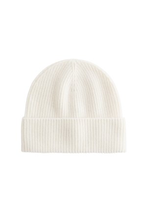 White ribbed knit beanie with a folded cuff, soft texture, and a snug fit, designed for warmth and comfort.