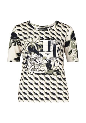 Kortærmet t-shirt i creme med sorte og olivengrønne bølgemønstre, blomstergrafik og tekstdesign. Blødt, strækbart stof.