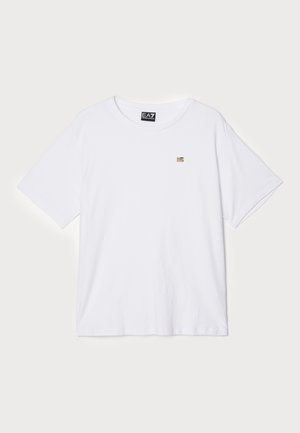 T-shirt bianco a maniche corte realizzato in morbido cotone, con un piccolo logo dorato nella zona sinistra del petto. Design a collo rotondo.