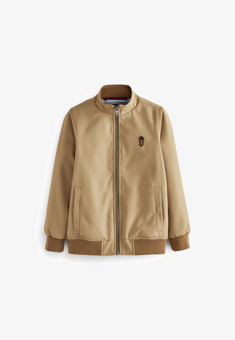 Veste bomber beige avec fermeture éclair sur le devant, poignets et ourlet côtelés, poches latérales, et petit logo cerf brodé sur la poitrine gauche.