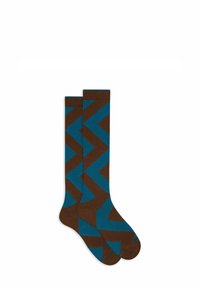Calze marroni con un audace motivo a zigzag in teal, realizzate in un morbido materiale testurizzato. Design al ginocchio con punta rinforzata.