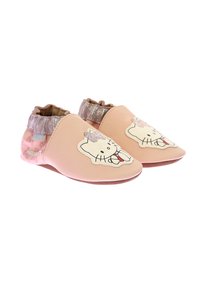Chaussures pour enfants en cuir rose avec un design Hello Kitty, présentant une cheville volantée pailletée et une semelle souple.
