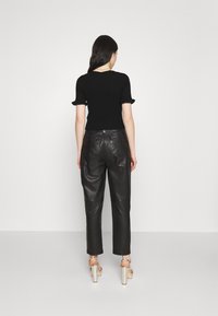 Monki Kofta - black