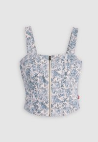 Blommönstrad denimcropp topp i en ljusblå, vit och grå färgpalett. Har en dragkedja framtill och breda axelremmar, strukturerad design.