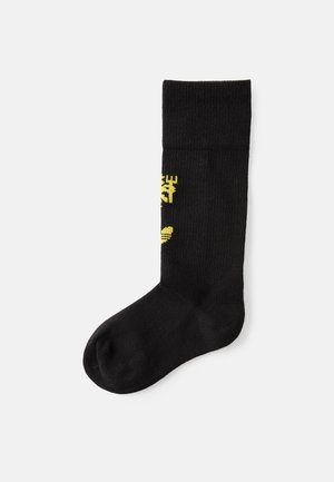 MANCHESTER UNITED THIRD MINI SOCKS UNISEX - Spordisokid - black/tribe yellow