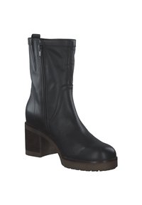 Black leather ankle boot with a side zipper, block heel, and textured sole. Offers a smooth finish with detailed stitching.