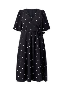 Czarna sukienka typu midi z kopertowym zapinaniem, białe kropki, krótkie bufiaste rękawy, dekolt w serek oraz wiązanie w talii z boku.