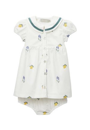 Robe de bébé blanche avec bloomer assorti, manches courtes bouffantes, col bordé de vert, boutons sur le devant, et imprimés floraux jaune citron et violet.