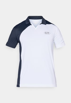 Short-sleeve polo shirt featuring a navy blue and white color block design, a ribbed collar, and a small EA7 logo on the chest.