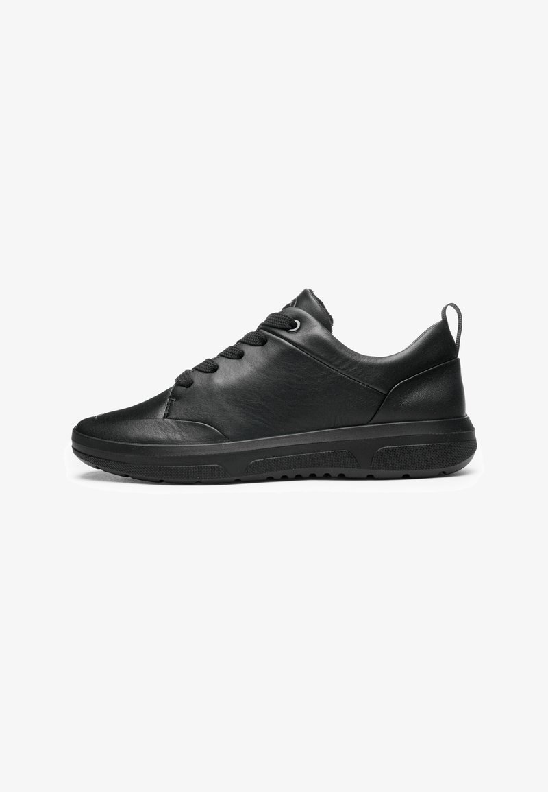 Black low-top sneaker with lace-up front, rounded toe, padded collar, and textured sole, shown in side profile on white background.