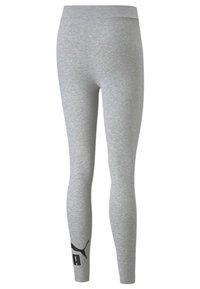 Leggings grises con una textura suave y una cinturilla alta. Presenta un acento de logotipo negro en la parte inferior de la pierna izquierda. Fabricados con tela elástica.
