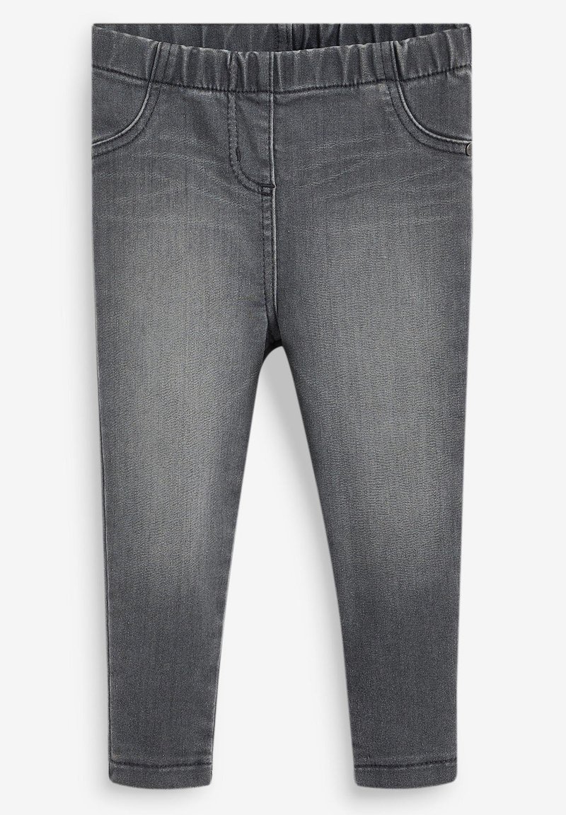 Leggings de mezclilla gris con cintura elástica, que presentan bolsillos falsos y una textura suave. La tela muestra un ligero desgaste.