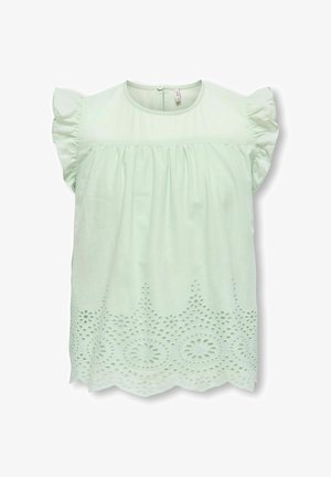 Blouse sans manches vert clair avec épaules à volants et broderie florale ajourée le long de l'ourlet festonné.