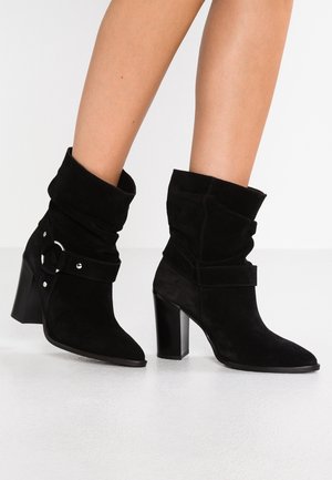 Klassiska stövletter - black
