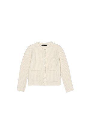Cream-colored knitted cardigan with long sleeves, featuring a round neckline, front buttons, and two patch pockets. Soft ribbed texture.