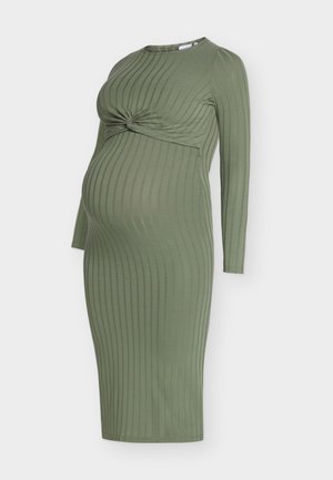 Abito premaman a coste verde oliva con maniche lunghe, caratterizzato da un dettaglio nodo frontale intrecciato e una silhouette aderente.