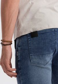 Ombre JOGGER - Džíny Slim Fit - light blue