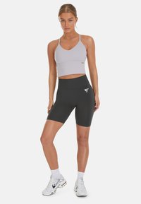 SQUATPROOF REPOSE ACTIVE  - Top - iris