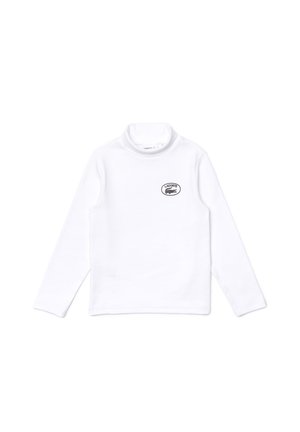 Hvid langærmet højhalset skjorte med lille sort Lacoste-logo på venstre bryst.