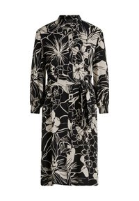 Blommönstrad klänning i svart och beige, med krage, långa ärmar, knappfront och knytbart midjebälte. Slät textur.