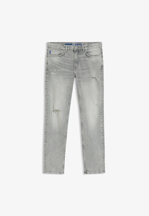 Jasnoszare jeansy o dopasowanym kroju, z przetartymi detalami na udach i kolanach, z zapięciem na guziki z przodu oraz z projektem z pięcioma kieszeniami.