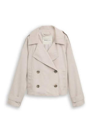 Hellbeige, kurz geschnittener Trenchcoat mit doppelter Knopfleiste, weitem Revers, geknöpften Manschetten und zwei vorderen Taschen, flach liegend.