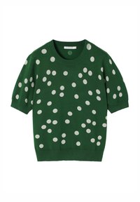 Zelený pletený svetr s krátkými rukávy, zdobený bílými puntíky různých velikostí a kulatým výstřihem. Měkká textura, neformální design.