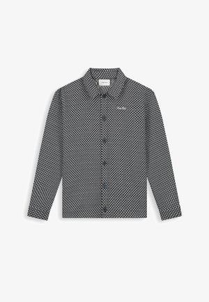 Zwart-wit overhemd met pied-de-poule patroon, lange mouwen, knoopsluiting en een kraag. Gemaakt van een lichtgewicht stof.