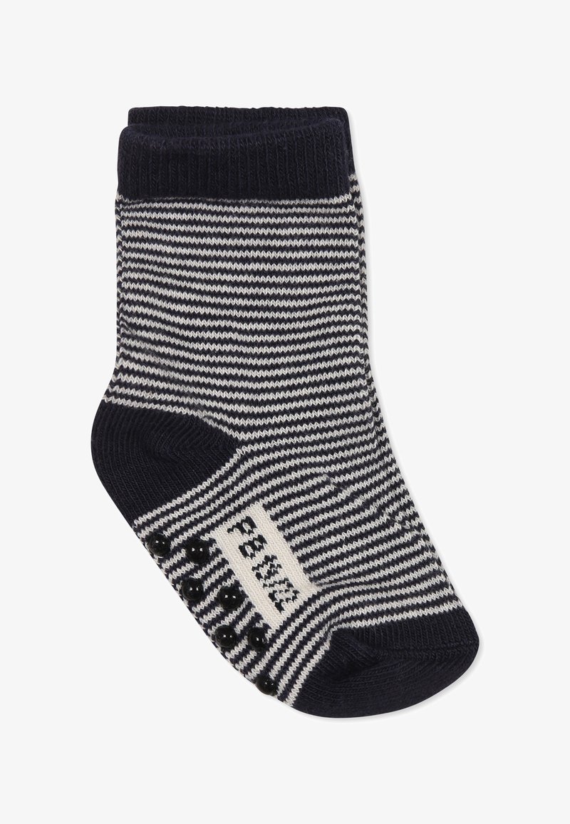 Paski skarpet w kolorze granatowym i białym, z ribbowanym mankietem, teksturowanym dnem dla lepszego chwytu oraz metką z czarnymi akcentami.