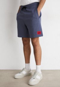 HUGO DIZ - Pantaloni de trening - open blue