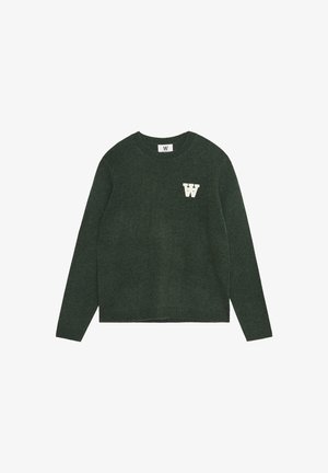Zeleni pulover od pletene tkanine, s okruglim izrezom, dugim rukavima i bijelim logotipom "W" na prsima. Riblji rub i manžetne.