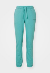 ESSENTIAL PANTS - Pantalon de survêtement - porcelain