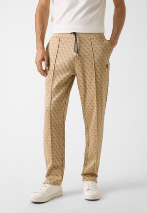 - Spodnie treningowe