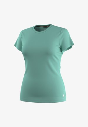 Dopasowany sportowy t-shirt damski w kolorze turkusowym, z krótkim rękawem i okrągłym dekoltem oraz małym logo w pobliżu lewego brzegu na dole.