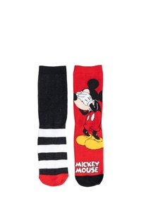 Calzini di Topolino: uno nero uniforme, l'altro rosso brillante con grafica di Topolino e scarpe gialle; con texture a strisce orizzontali bianche e nere.