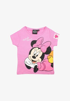 T-shirt en coton rose arborant un grand motif de Minnie Mouse avec un nœud. Manches courtes et une petite patch fleurie sur une manche.