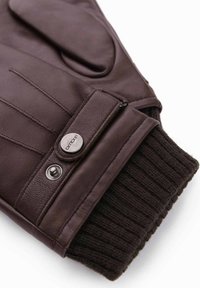 Guanto in pelle marrone scuro con cinturino regolabile a scatto e polsino in maglia a coste nero su sfondo bianco.