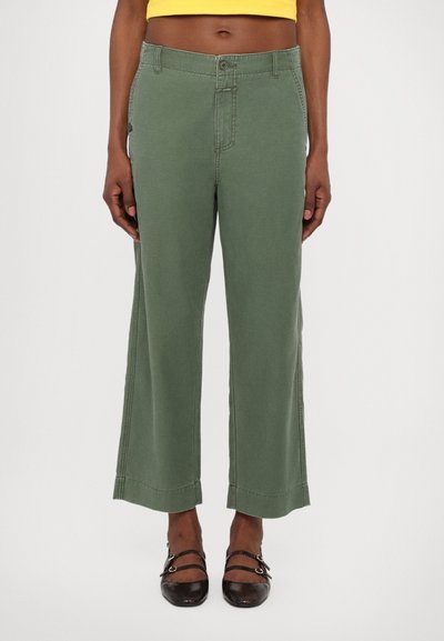 Green wide-leg pants made of cotton blend, featuring a button closure, front pockets, and a cropped hem. Smooth texture, minimal stitching details.