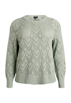 Pullover lavorato a maglia verde chiaro con motivo a zigzag, scollatura rotonda e polsini e orlo a coste. Il materiale è leggero e presenta una finitura texturizzata.