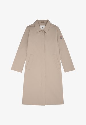 Beige regnrock med krage, långa ärmar, två framfickor och ett logotypsmärke på vänster ärm. Tillverkad av ett mjukt, vattentåligt material.