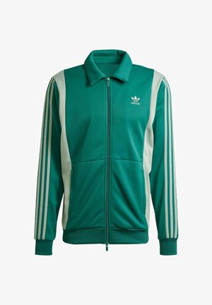 Green zip-up jacket made of textured fabric with white side panels and three white stripes on sleeves. Features a collar and front pockets.