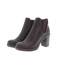 Stivaletti in pelle marrone con tacco chunky, pannelli laterali elasticizzati, punta rotonda e suola texturizzata per una buona aderenza.
