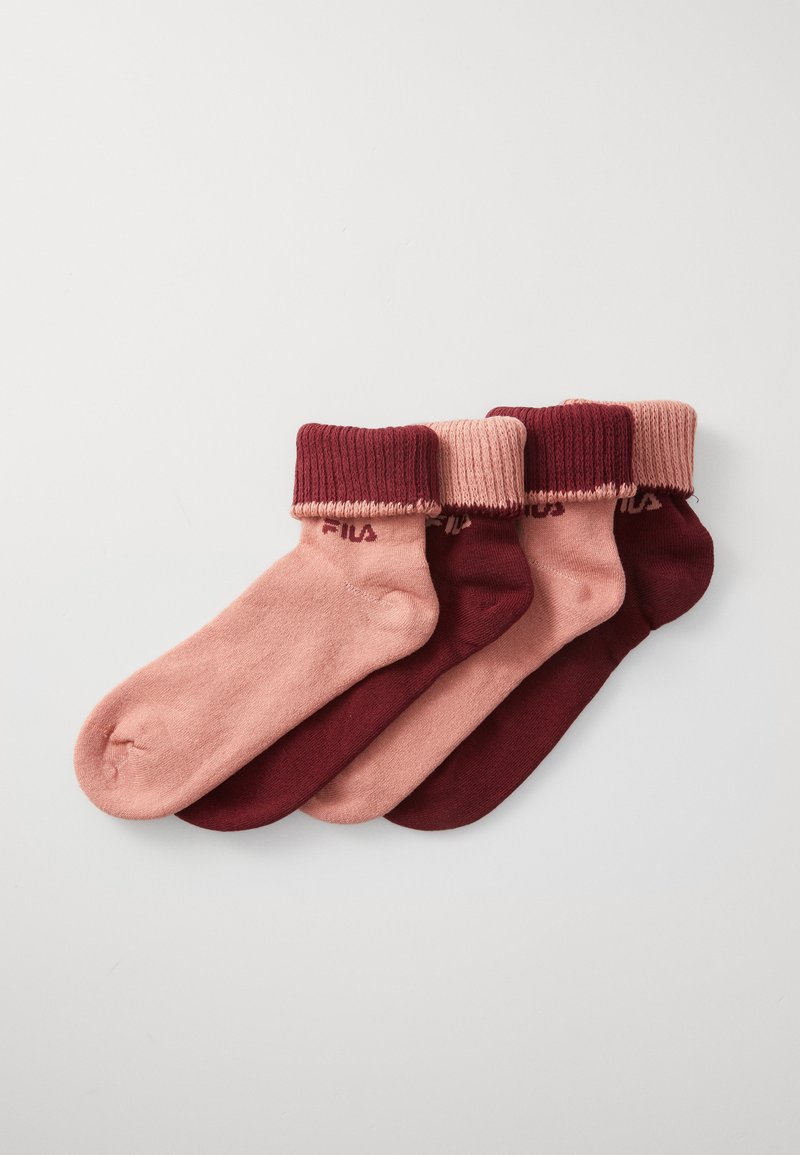 Paket med fyra strumpor i olika nyanser av rosa och burgundy. Har ribbade muddar och en slät textur med en logotyp på varje strumpa.