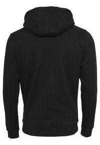 Černá mikina s kapucí, dlouhými rukávy, žebrovanými manžetami a lemem, hladkou texturou a jemným leskem na látce. Jednoduchý a minimalistický design.