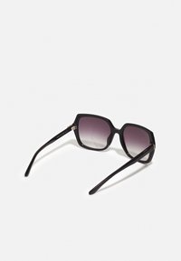Calvin Klein Occhiali da sole - black
