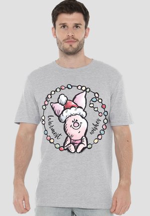 Gray cotton t-shirt featuring a cartoon pig character wearing a Santa hat, surrounded by colorful string lights and the text "Warmest Wishes."