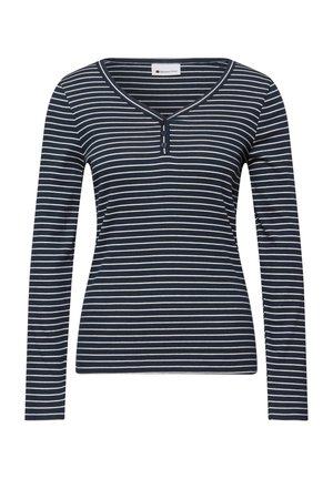 Chemise bleu marine à manches longues avec des rayures horizontales blanches, un décolleté en V et deux petits boutons à l'avant.